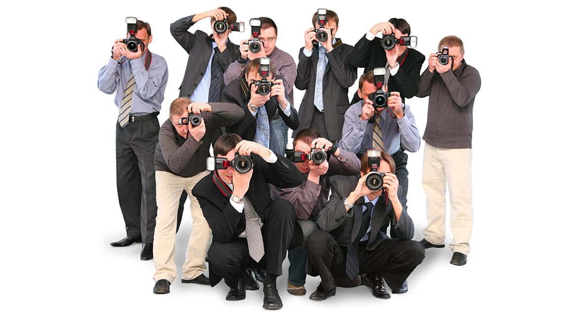 Professional photographers working on location in London
